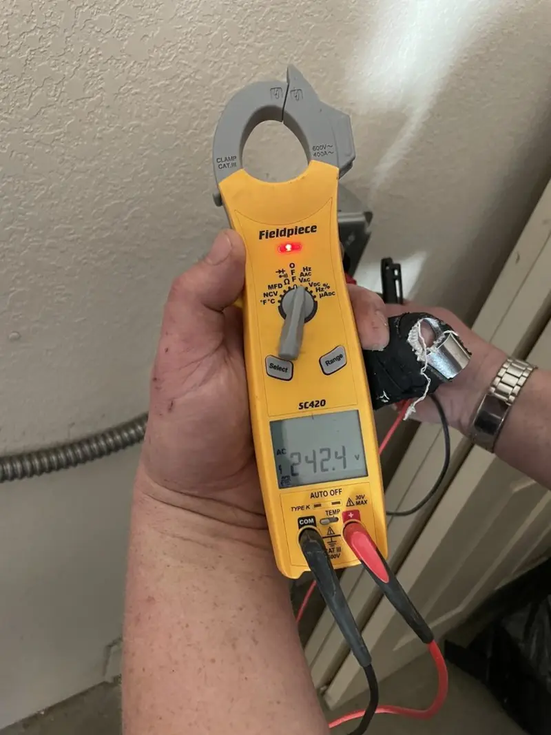 Voltage testing with clamp meter during Generator Installation in Huntsville